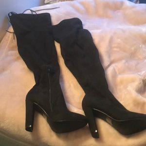 Black suede over knee boots.